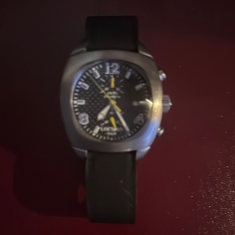 Sleek Silver Dial Black Strap Watch